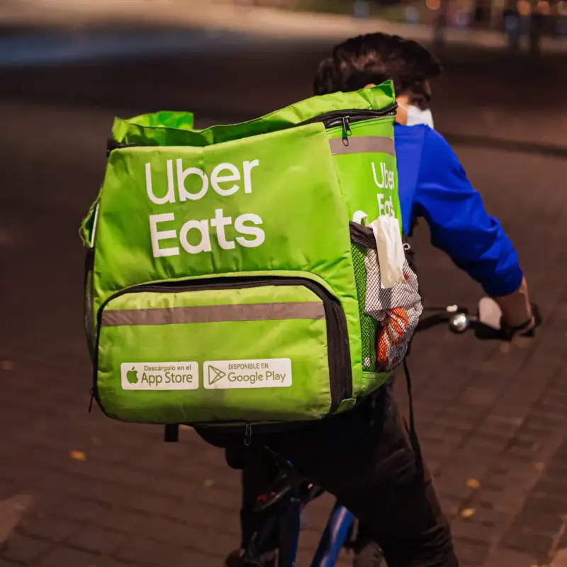 Uber Eats bicycle courier on a night delivery