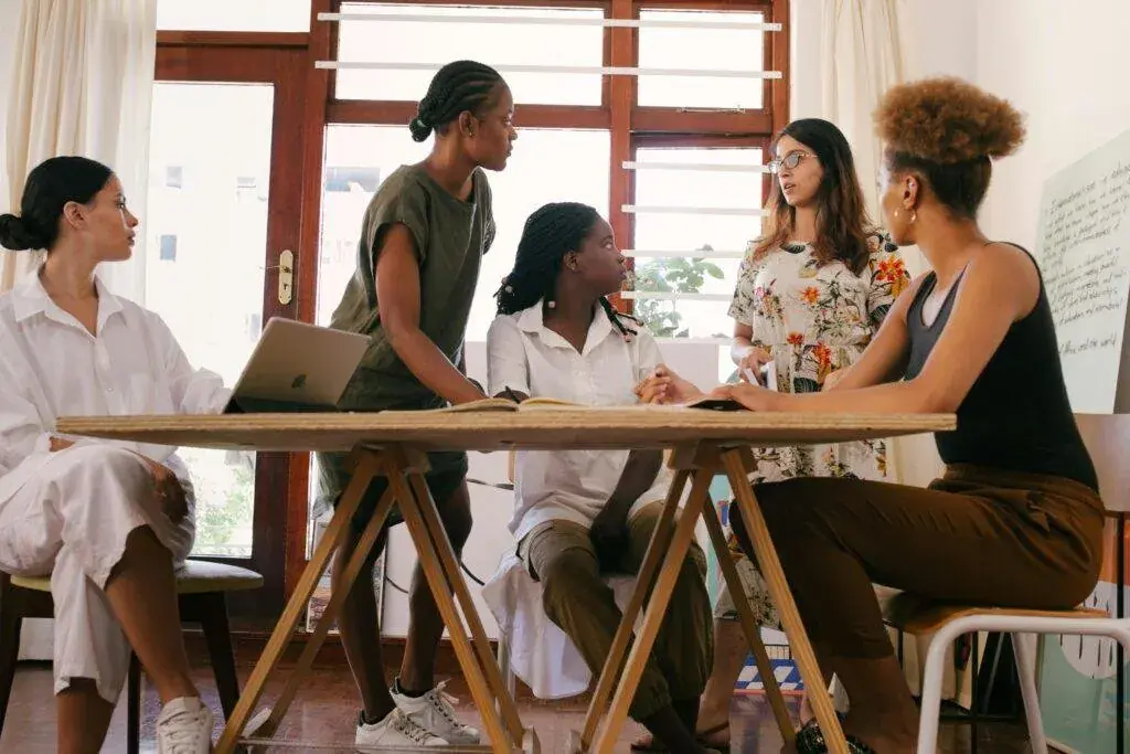 Team collaborating around a table