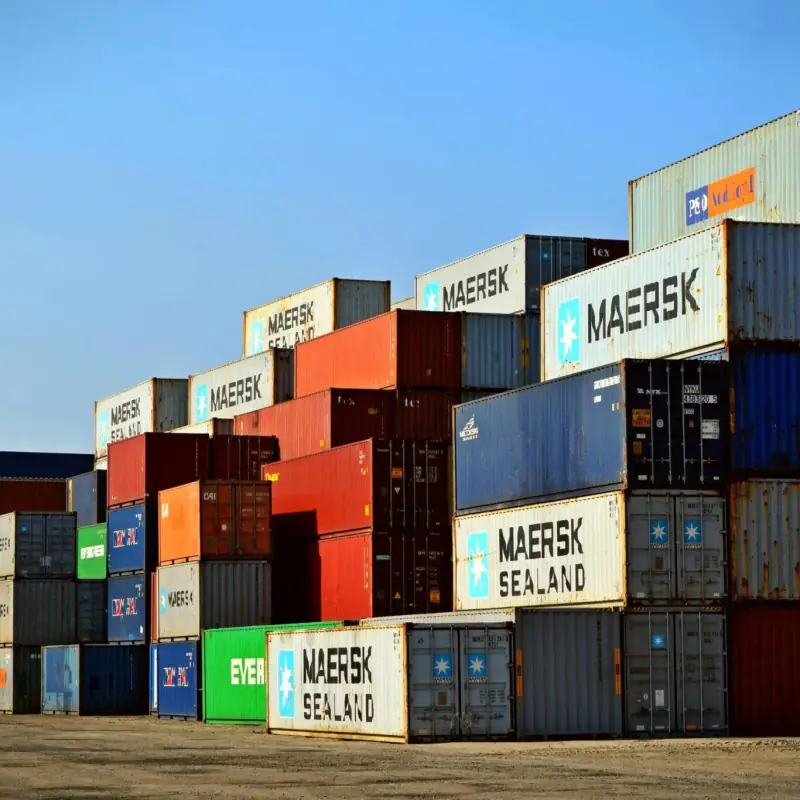 Shipping containers stacked at a yard