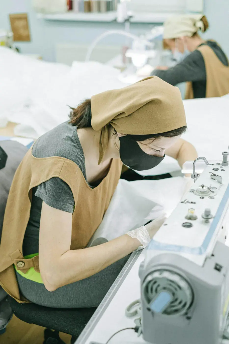 Garment workers at sewing machines